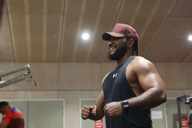 Josh smiling during a workout